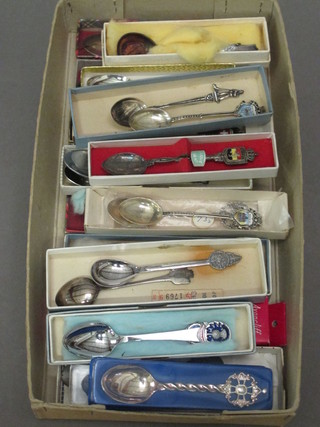 A collection of enamelled souvenir spoons