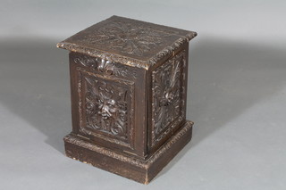 A Victorian carved oak coal box 17"