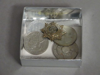 An Army Service Corps cap badge, an aluminium medal struck  from the first lot of British aluminium together with 3 crowns