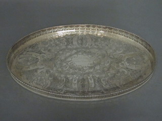 An engraved oval silver plated tea tray 18"
