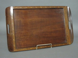 A rectangular mahogany twin handled tea tray 25"