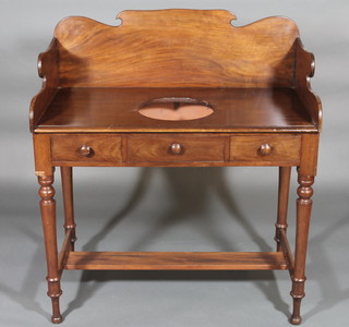 A Victorian mahogany wash stand with three-quarter gallery and  bowl receptacle, the base fitted 2 drawers, raised on turned  supports 36" 40-60
