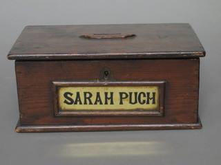 A 19th Century rectangular pine money box with hinged lid marked Sarah Pugh 9"