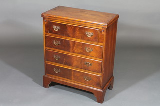 A Georgian style mahogany bachelor's chest of 4 long graduated  drawers, raised on bracket feet 25"