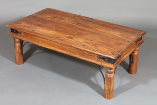 A rectangular Eastern hardwood and studded coffee table 43"