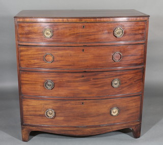 A Georgian mahogany bow front chest of 4 long drawers with  octagonal brass handles, raised on splayed bracket feet 39"  ILLUSTRATED
