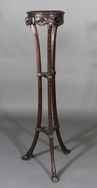 An Adam style mahogany jardiniere stand with rams horn  decoration, raised on 3 outswept supports