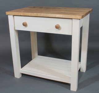 A pine and white painted rectangular kitchen unit fitted a drawer,  raised on square supports 36"