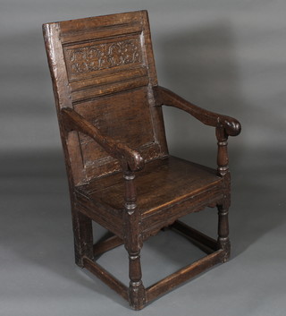 An 18th Century oak Wainscot chair of panel construction   ILLUSTRATED
