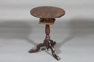 An 18th/19th Century oak and elm circular snap top wine table  with bird cage action 18"