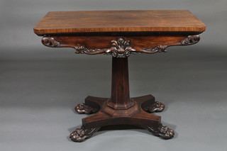 A William IV rosewood card table, raised on a chamfered  column with triform base 36"  ILLUSTRATED