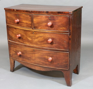 A 19th Century mahogany bow front chest of 2 short and 2 long drawers, raised on splayed bracket feet 35 1/2"