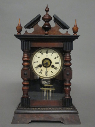 An American 30 hour striking shelf clock with paper dial and Roman numerals contained in a walnut case