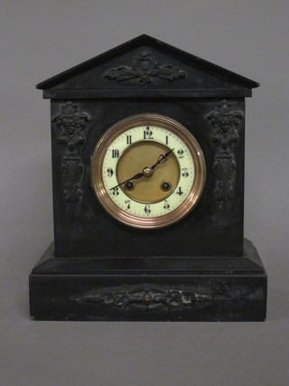A Victorian 8 day striking mantel clock with enamelled dial and Arabic numerals contained in a marble architectural case