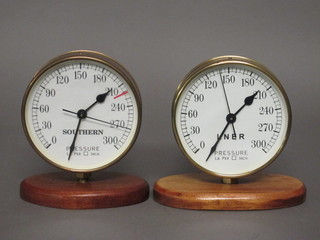 A decorative battery operated mantel clock in the form of an  LNER pressure gauge, contained in a brass case and 1 other  marked Southern
