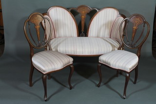 An Edwardian 3 piece inlaid mahogany salon suite comprising a showframe 2 seat settee and 2 matching shield back chairs with  upholstered seats, raised on cabriole supports