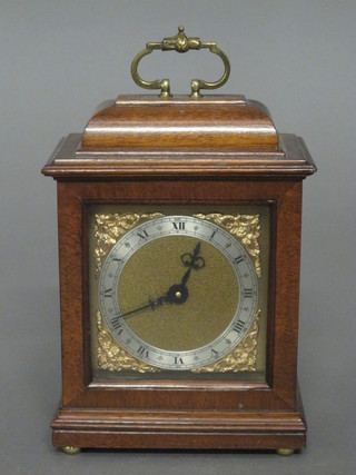 A reproduction Georgian style bracket clock with square gilt dial  and silvered chapter ring, contained in a walnut case