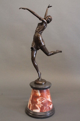An Art Deco style bronze figure of a dancing girl, raised on a conical marble base 26"