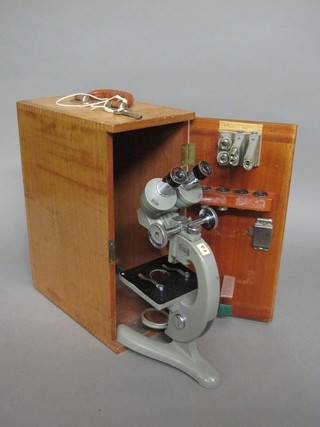 A Beck binocular microscope complete with lenses