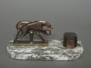 An Art Deco spelter and onyx standish decorated grey hounds  10"