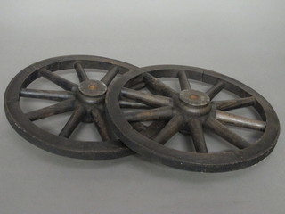 A pair of iron shod wooden spoke wheels 14"