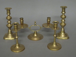 2 pairs of 19th Century brass candlesticks together with a twin light candelabrum