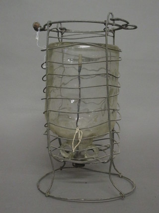 A wire and metal distilled water dispenser