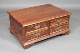 A rectangular hardwood coffee table fitted 8 drawers, raised on bracket feet, 36"