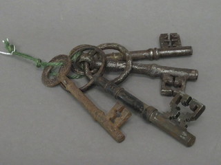 4 various antique iron keys