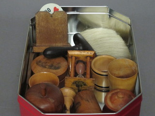 A Mochaware egg timer decorated Beech Head light house  together with a collection of other treen items