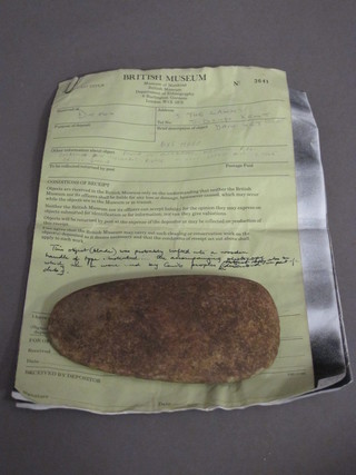 An axe head 6" complete with British Museum paperwork