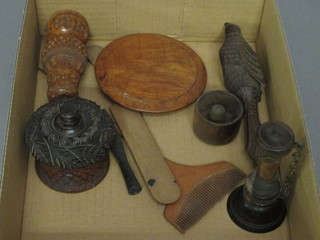 A 19th Century wood nut cracker in the form of a game bird  marked RIGI, a turned lignum vitae whistle, a circular carved  wood jar and cover, do. pepperette etc