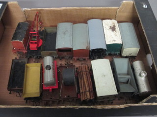 A collection of various O gauge rolling stock