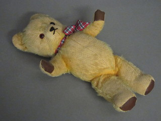 A yellow teddybear with brown pads 13"