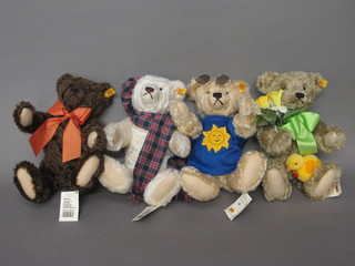A set of 4 Steiff teddybears representing the Four Seasons, all with buttoned and tagged ears, growlers and numbered tickets