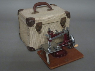 A childs manual sewing machine