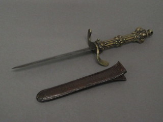 A double bladed poignard with 6" blade and gilt metal mount