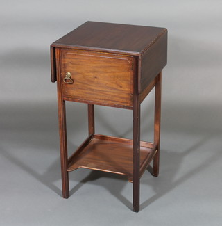 A Georgian style mahogany drop flap night table, fitted a cupboard enclosed by a panelled door with undertier, raised on  square tapering supports 15"