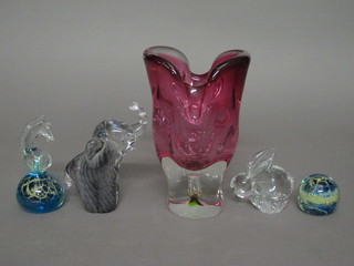 A red Art Glass vase 9", a Murano glass paperweight decorated a sea horse 5" and 3 other paperweights