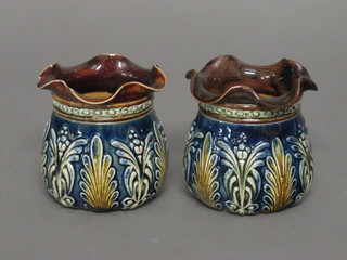 A pair of circular Doulton Lambeth vases with wavy mouths, the bases impressed 1068 3 1/2"