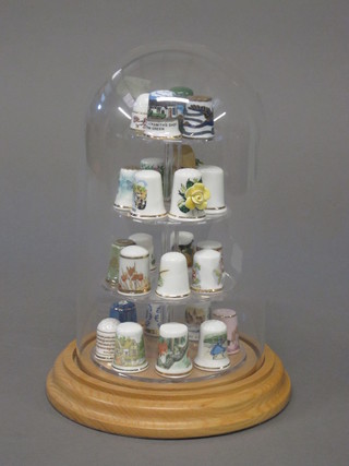 A collection of thimbles contained under a dome