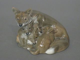 A Royal Copenhagen figure of a seated vixen with cubs, base  marked 1788 5"