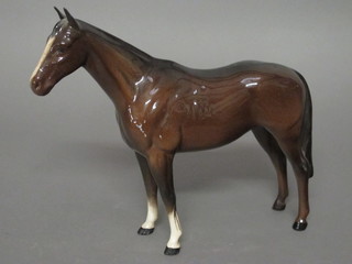A Beswick figure of a Bay horse 8 1/2"