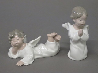A Lladro figure of a reclining Angel 5", together with a Lladro figure of a kneeling Angel 5"