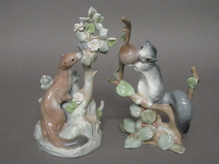 A pair of Lladro figures of a Stoat and Squirrel 10"