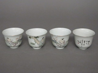 4 Oriental saki cups decorated figures and characters