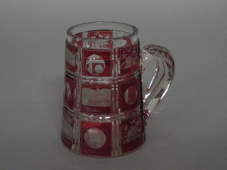 A Bohemian red glass tankard decorated various buildings 5"
