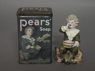 A biscuit porcelain figure of Bubbles 6", pipe missing, together with a Pear's soap tin