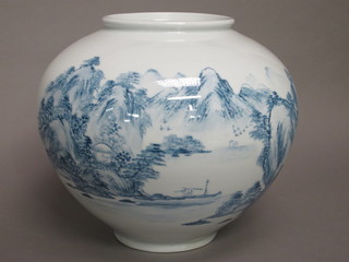 An Oriental style globular shaped blue glazed porcelain vase decorated landscapes 12"