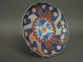 A 19th Century Japanese Imari porcelain plate with lobed body  12"